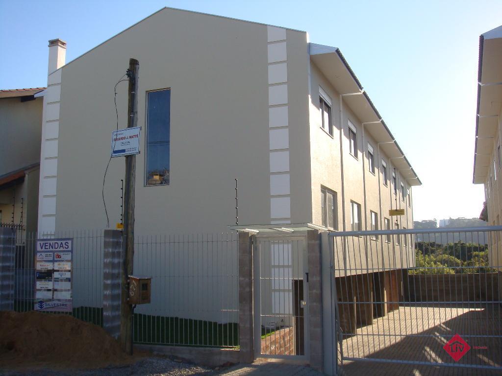 Sobrados - 2 Dorm.<br />São Luiz<br />Caxias Do Sul<br /><br />Sobrado triplex com 2 dormitórios, banheiro social, sala e cozinha integrados, área de serviço, lavabo, pátio e 2 vagas de garagem.
